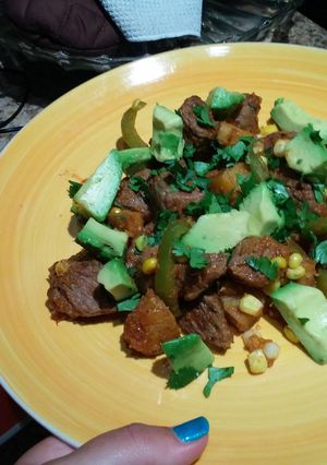 A picture of Mexican-style steak and potatoes..
