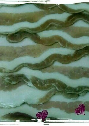 A picture of homemade bacon.