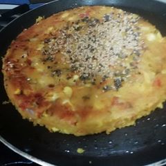 A picture of Corn and Poha Cake.