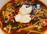 A picture of red kidney beans in crock pot