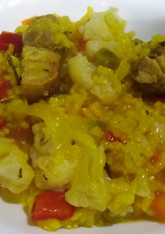 Una foto de Arroz con coliflor y costilla