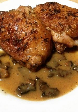 A picture of Roasted Garlic-Rosemary-Thyme Chicken with Shiitake Gravy.