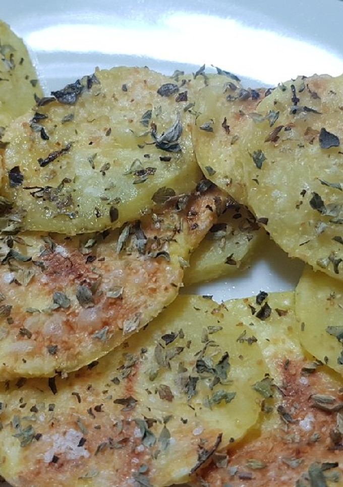 Una foto de Patatas crujientes aliñadas al microondas
