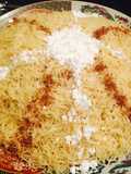 Fideos al vapor con pollo السفة مدفونة