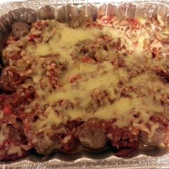 A picture of stuffed cheesy meatballs.