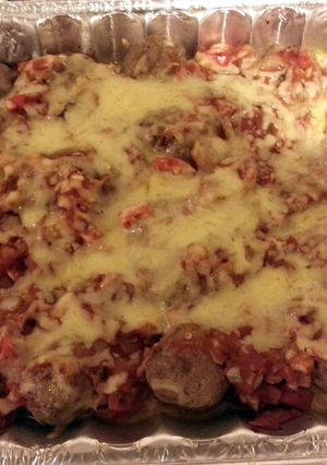 A picture of stuffed cheesy meatballs.