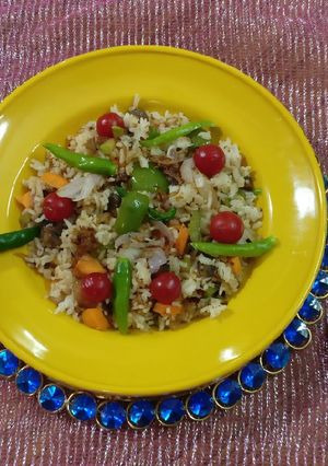 A picture of Rice with mushroom & cherry tomatoes.