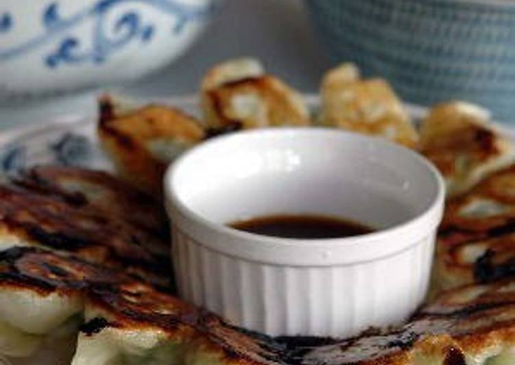 Crispy Gyoza Dumplings with Bean Sprouts and Garlic Chives