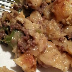 A picture of Cheesy beef potatoes and peppers.