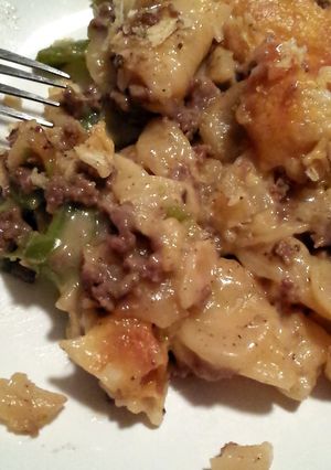 A picture of Cheesy beef potatoes and peppers.