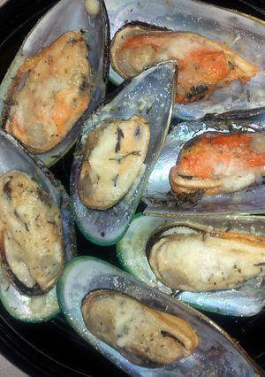 A picture of Mussel parmesan.