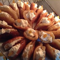 A picture of Qatayef With Cream.