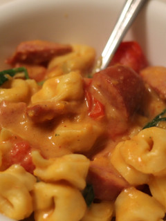 A picture of Sweet Potato Alfredo Tortellini with Kielbasa.
