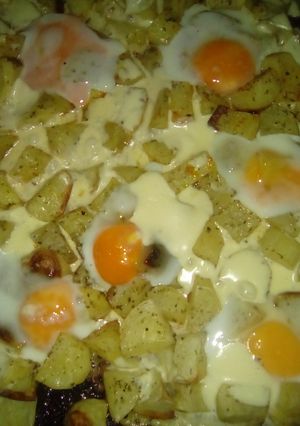 Una foto de Papas con queso