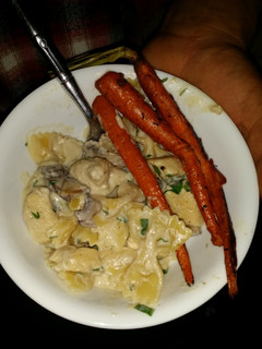 A picture of Chicken Alfredo with Mushrooms.