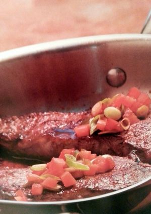 A picture of Kansas city Skillet Stake with Merlot and Plum Tomato Salsa.