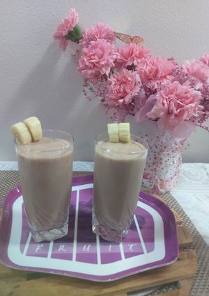 A picture of Banana with chocolate ice cream shake.