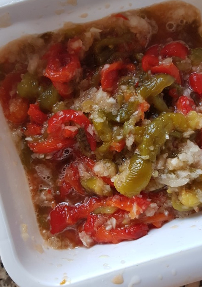 Una foto de Aliño de pimientos asados