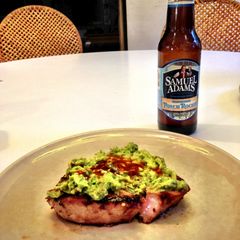 A picture of Grilled Tuna Steak w/ Homemade Guacamole.