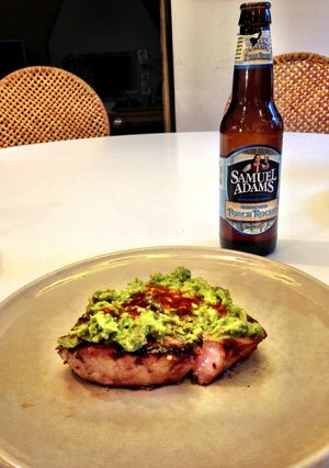 A picture of Grilled Tuna Steak w/ Homemade Guacamole.