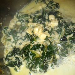 A picture of creamy spinach with pepper feta.