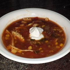 A picture of Crock Pot Chicken Enchilada Soup.