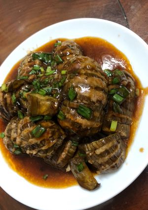Hình của món Cà tím nhồi thịt sốt chua ngọt.