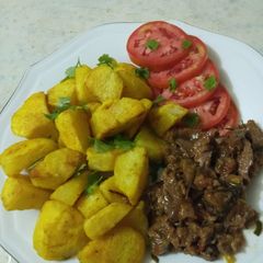 A picture of Tumeric baked potatoes.