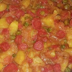 A picture of Aloo gajar matar veg.
