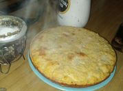 Una foto de pan de garbanzos en sartén
