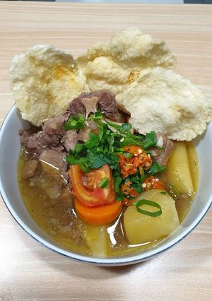 A picture of Super Tender Oxtail Soup Cooked in a Slow Cooker.