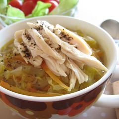 A picture of Chicken Tenders and Julienned Vegetable Soup.