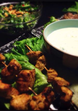 A picture of Green curry chicken kebabs with Minty yogurt sauce.