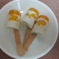 A picture of Mango coconut popsicle.