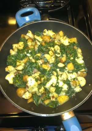 A picture of Sautee spinach, cauliflower and potatoes.