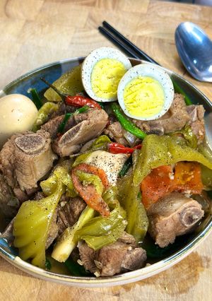 A picture of Braised Pork Ribs w/ Pickled Mustard Greens | Sườn Kho Cải Chua.