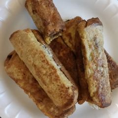 A picture of Super easy Nutella french toast roll ups!.