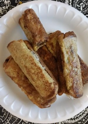 A picture of Super easy Nutella french toast roll ups!.
