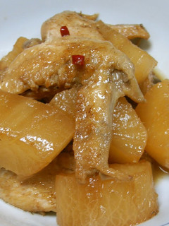A picture of Simmered Chicken Wings and Daikon (White Radish).