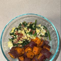 A picture of Scrambled Eggs with Spinach and Roasted Sweet Potatoes.
