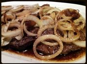 A picture of thin sliced steak