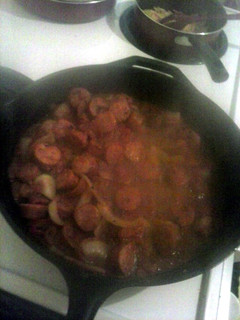 A picture of sausage in tomatoe gravy.