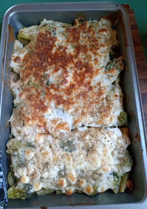 Una foto de Vegetariana - Pastel de verduras, con salsa blanca