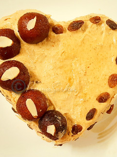 A picture of Gulab Jamun Cake.