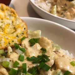 A picture of Cream of Chicken, Cheese and Broccoli over Rice.