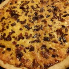A picture of Nikki's Kickin' BBQ Chicken &Bacon Pizza.