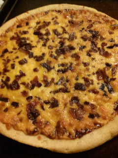 A picture of Nikki's Kickin' BBQ Chicken &Bacon Pizza.