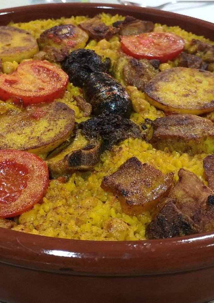Una foto de Arroz al horno estilo tradicional