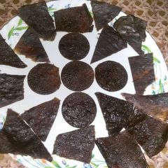 A picture of Black tangy aam papad.