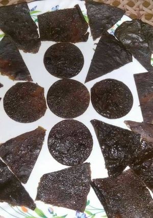 A picture of Black tangy aam papad.